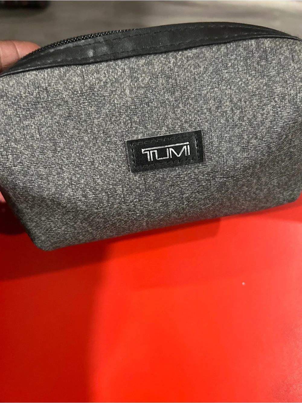 Tumi Gray Textured travel Toiletry Dopp Kit contents sealed
